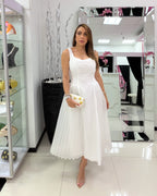 WHITE PLEATED MIDI DRESS